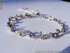 Bratara designer aur 14K, 6.2g, model floral incantator ornata cu 1.11 CARATE TANZANITE si BRILIANTE !!