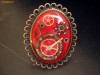 inel steampun oval, dantelat  (realizat din piese de ceas) bronz, rosu