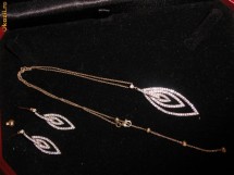 superb set aur galben 14K..austria..cercei si lantisor cu pandant ..12,11g foto