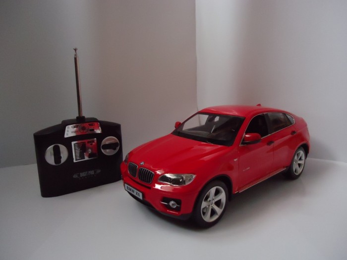 MASINA BMW X6 1:14 cu radiocomanda-super masinuta BMW X6-OKAZIE SARBATORI-PRODUS NOU ! CALITATE !!! foto mare MASINA BMW X6 1:14 cu radiocomanda-super masinuta BMW X6-OKAZIE SARBATORI-PRODUS NOU ! CALITATE !!! foto mare