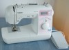 Masina de Cusut Computerizata Brother Innovis 10A + piciorus de surfilare F054N + florare
